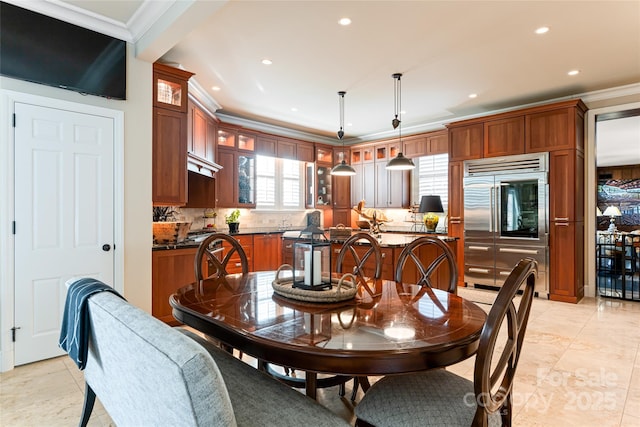 dining area featuring crown molding, recessed lighting, and light tile patterned flooring