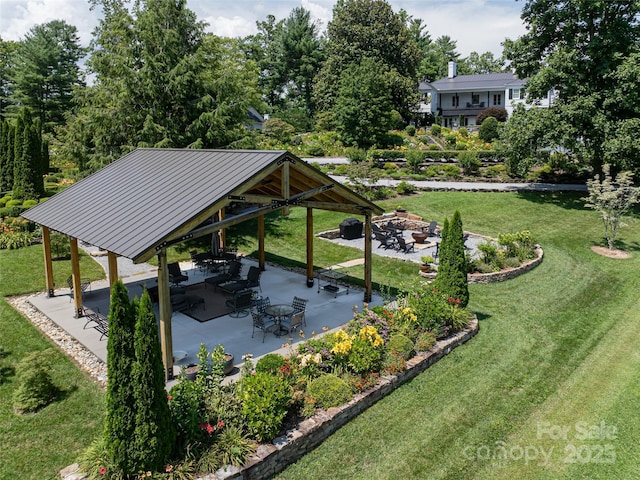 365 Sherwood Dr S, Flat Rock, NC 28731 - view of home's community with a gazebo, a fire pit, a lawn, and a patio area