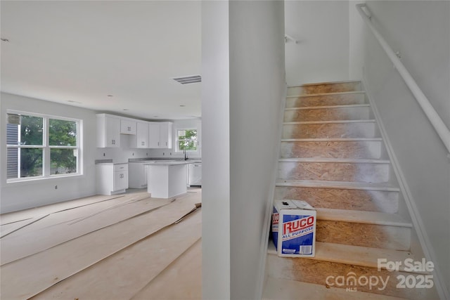 513 Harrel St, Salisbury, NC 28144 - stairway featuring healthy amount of natural light