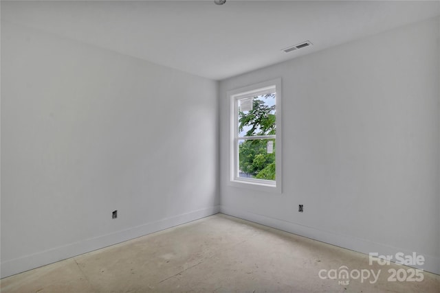 513 Harrel St, Salisbury, NC 28144 - spare room with baseboards and concrete flooring