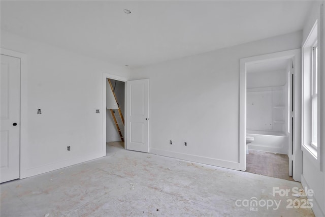 513 Harrel St, Salisbury, NC 28144 - unfurnished bedroom featuring baseboards and ensuite bathroom