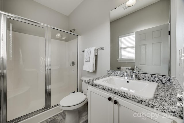10071 Highland Creek Cir, Indian Land, SC 29707 - bathroom with visible vents, toilet, a shower stall, and vanity