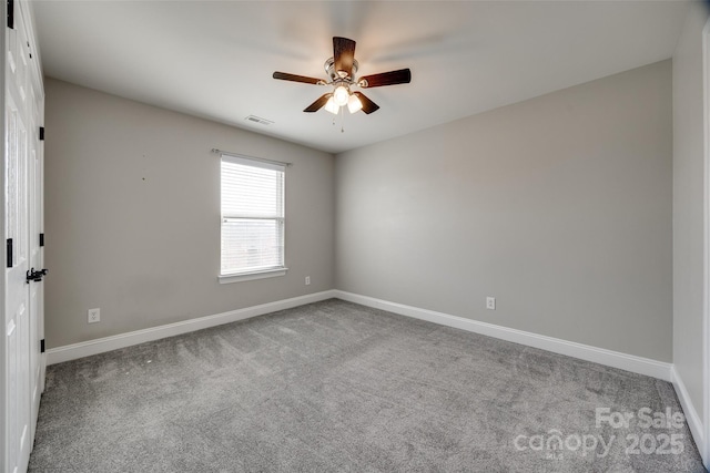 10071 Highland Creek Cir, Indian Land, SC 29707 - carpeted spare room with baseboards, a ceiling fan, and visible vents