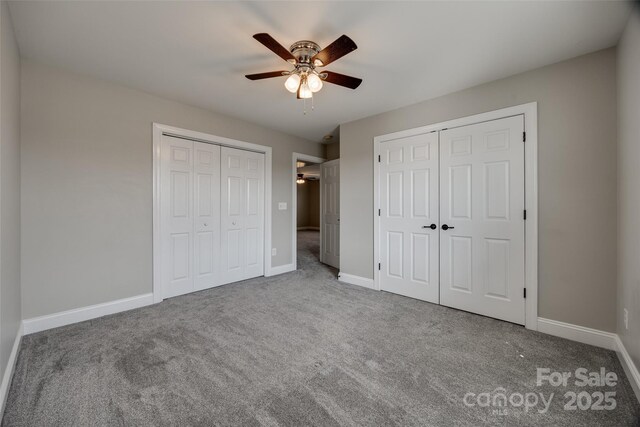 10071 Highland Creek Cir, Indian Land, SC 29707 - unfurnished bedroom featuring carpet floors, multiple closets, and baseboards