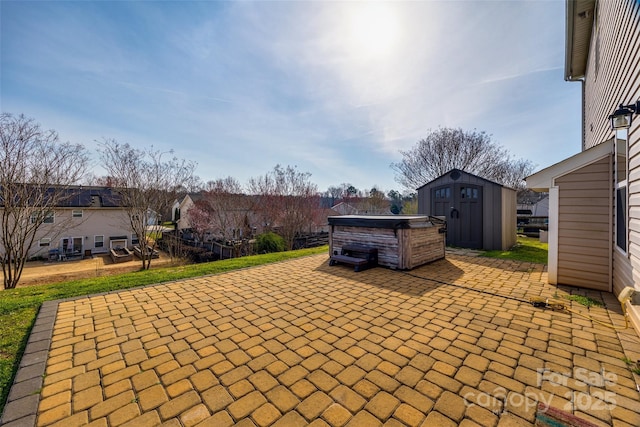 10071 Highland Creek Cir, Indian Land, SC 29707 - view of patio / terrace featuring an outbuilding, a storage unit, and a residential view