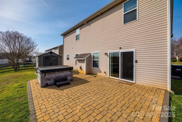 10071 Highland Creek Cir, Indian Land, SC 29707 - back of house featuring a storage shed, a yard, an outdoor structure, a patio area, and fence