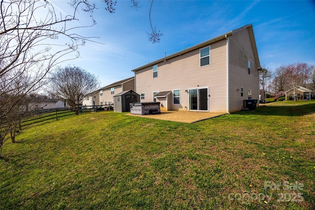 10071 Highland Creek Cir, Indian Land, SC 29707 - rear view of property featuring a patio area, a yard, fence, and a hot tub
