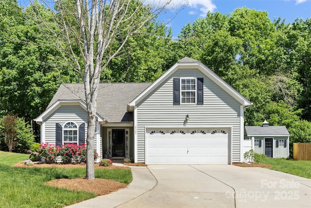 4323 Wiregrass Rd, Indian Land, SC 29707 - view of front facade with driveway, roof with shingles, a front yard, a garage, and fence