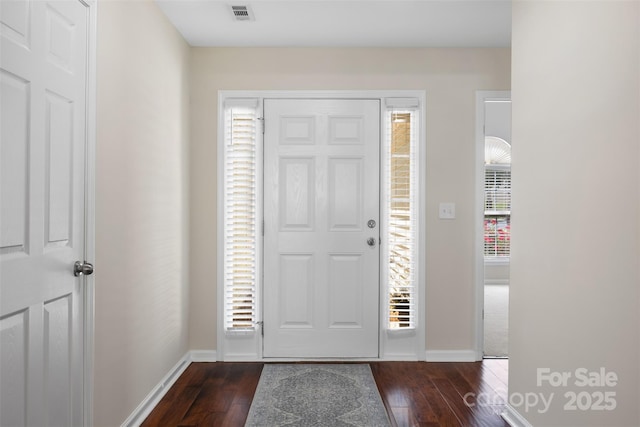 4323 Wiregrass Rd, Indian Land, SC 29707 - entrance foyer featuring visible vents, dark wood finished floors, and baseboards