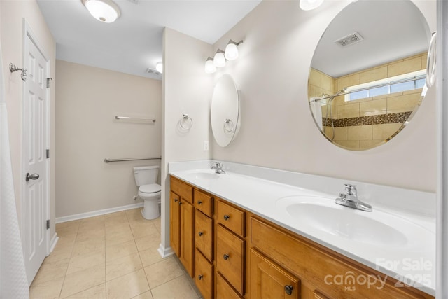 4323 Wiregrass Rd, Indian Land, SC 29707 - bathroom with double vanity, toilet, visible vents, and a sink