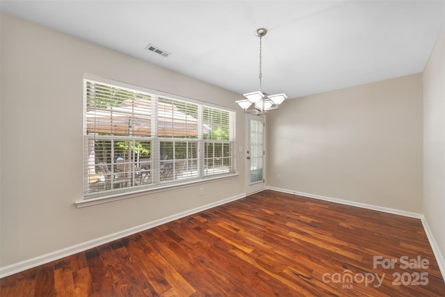 4323 Wiregrass Rd, Indian Land, SC 29707 - unfurnished room featuring an inviting chandelier, baseboards, wood finished floors, and visible vents