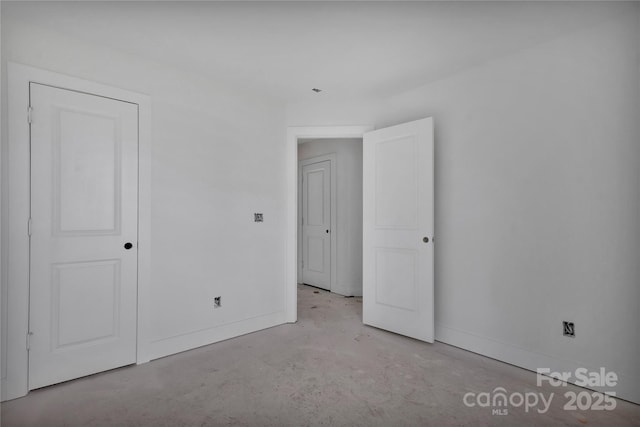 515 Harrel St, Salisbury, NC 28144 - empty room featuring concrete floors and baseboards