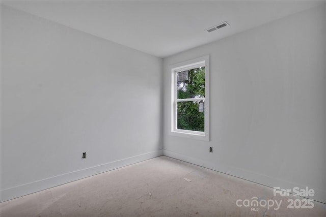 515 Harrel St, Salisbury, NC 28144 - spare room featuring baseboards and concrete floors