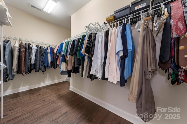 7909 Parknoll Dr, Huntersville, NC 28078 - walk in closet with visible vents and wood finished floors