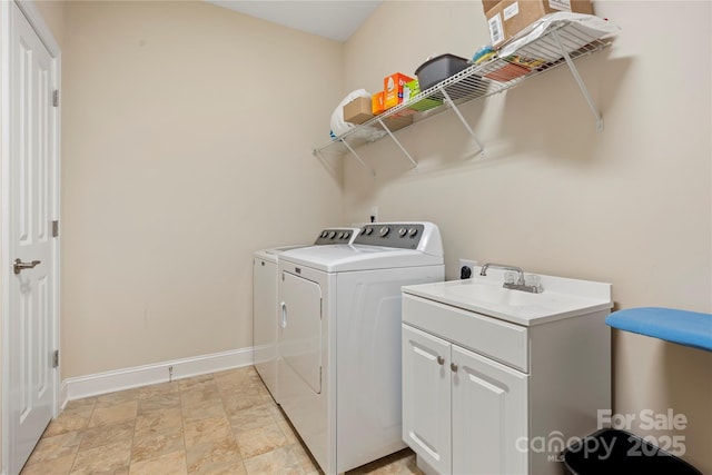 7909 Parknoll Dr, Huntersville, NC 28078 - clothes washing area with a sink, baseboards, cabinet space, and washing machine and dryer