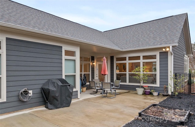 7909 Parknoll Dr, Huntersville, NC 28078 - rear view of property with a patio area and a shingled roof