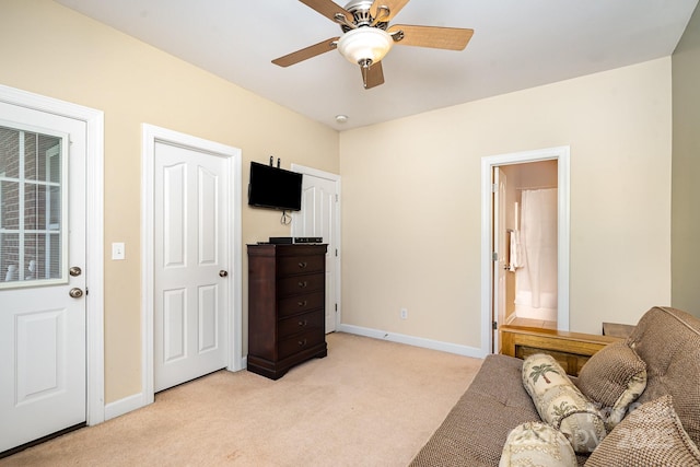 615 Vega St NW, Concord, NC 28027 - living area with light colored carpet, baseboards, and a ceiling fan