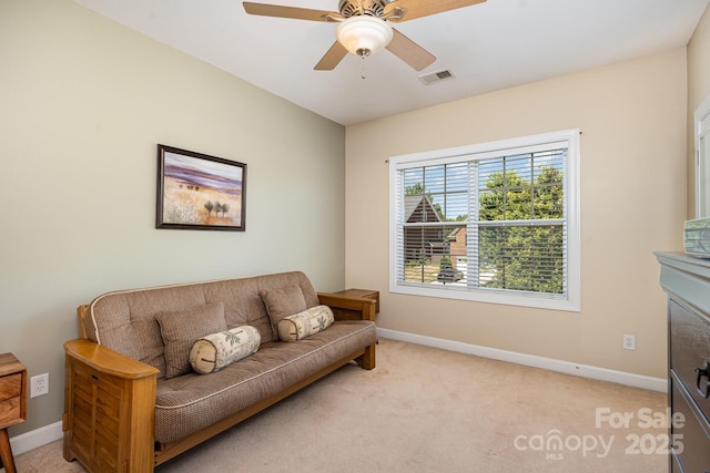 615 Vega St NW, Concord, NC 28027 - living room featuring light colored carpet, baseboards, and ceiling fan
