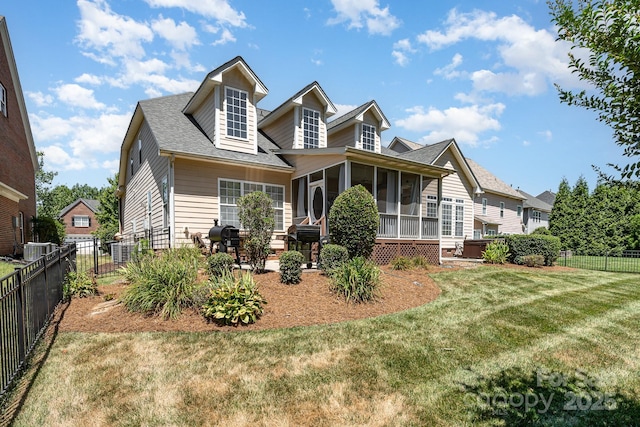 615 Vega St NW, Concord, NC 28027 - back of property featuring a sunroom, a shingled roof, central air condition unit, and a patio area