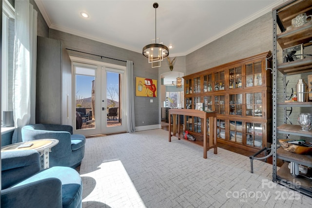 interior space with french doors, ornamental molding, baseboards, and recessed lighting