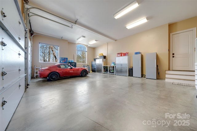 garage featuring freestanding refrigerator
