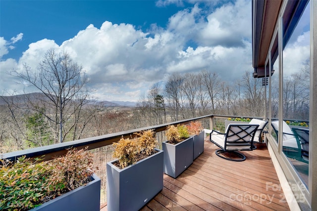 deck featuring a mountain view
