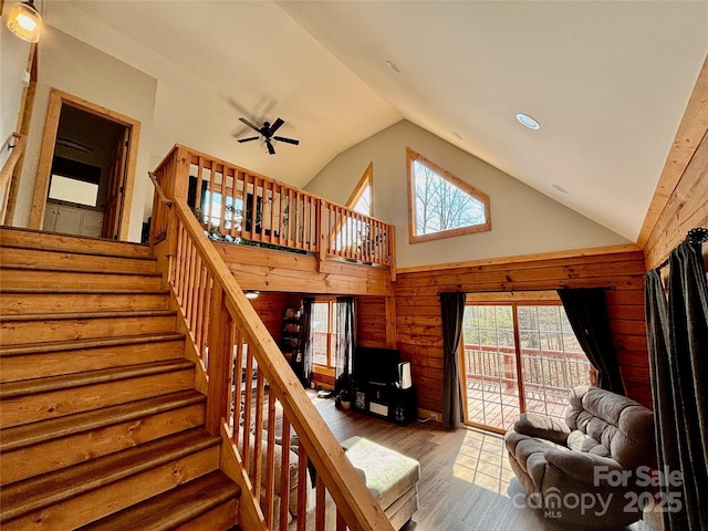 522 Woodgate Dr, Bostic, NC 28018 - stairs with wood finished floors, wood walls, high vaulted ceiling, and recessed lighting