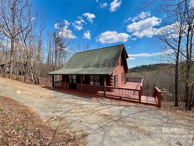 522 Woodgate Dr, Bostic, NC 28018 - view of front of house featuring covered porch and roof with shingles