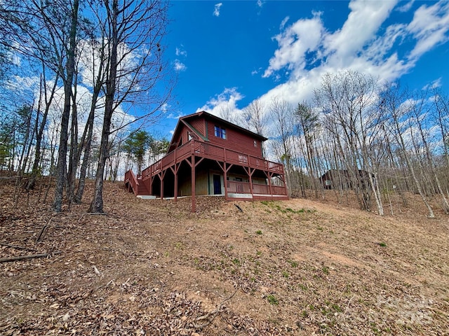 522 Woodgate Dr, Bostic, NC 28018 - rear view of house with a wooden deck