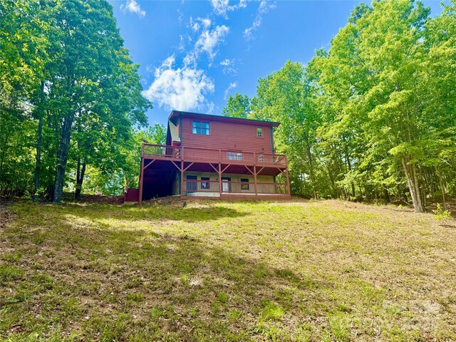 522 Woodgate Dr, Bostic, NC 28018 - back of house featuring a wooden deck and a lawn