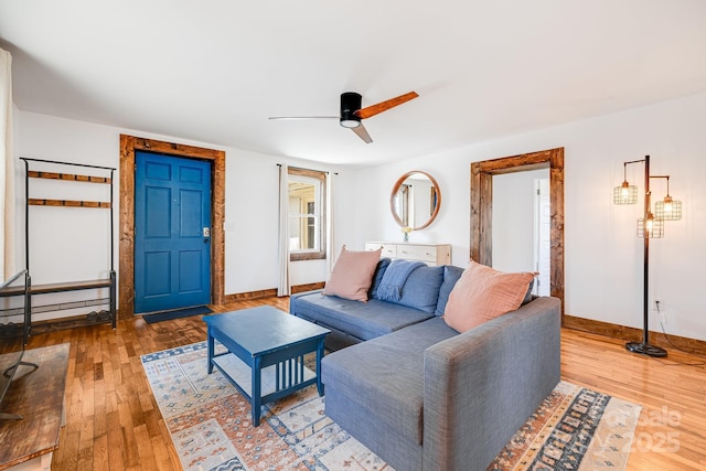 323 Emma Rd, Asheville, NC 28806 - living area with hardwood / wood-style floors, baseboards, and a ceiling fan