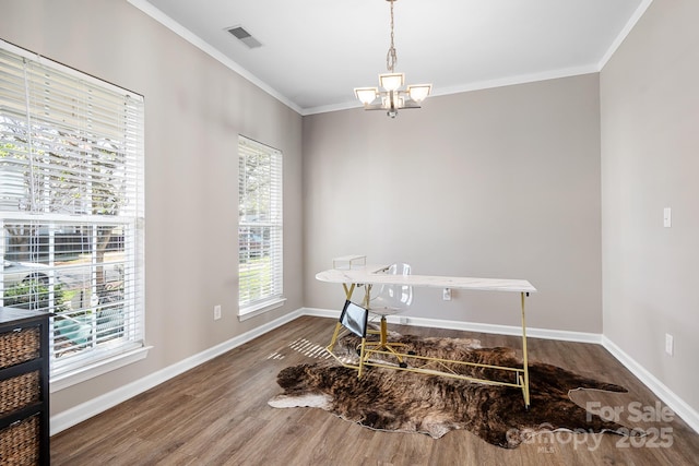 office area featuring baseboards, an inviting chandelier, wood finished floors, and crown molding