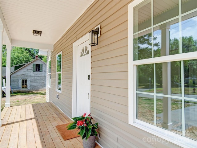 deck with covered porch