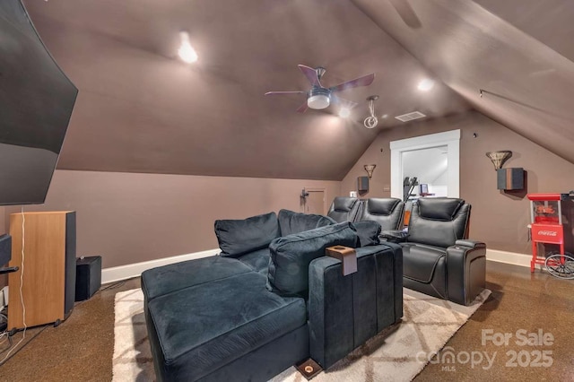 cinema featuring lofted ceiling, visible vents, baseboards, carpet flooring, and ceiling fan