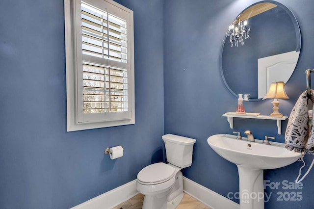 4536 Rustling Woods Dr, Denver, NC 28037 - bathroom with healthy amount of natural light, toilet, and baseboards