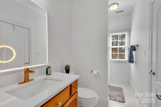 4536 Rustling Woods Dr, Denver, NC 28037 - bathroom with vanity, toilet, and baseboards