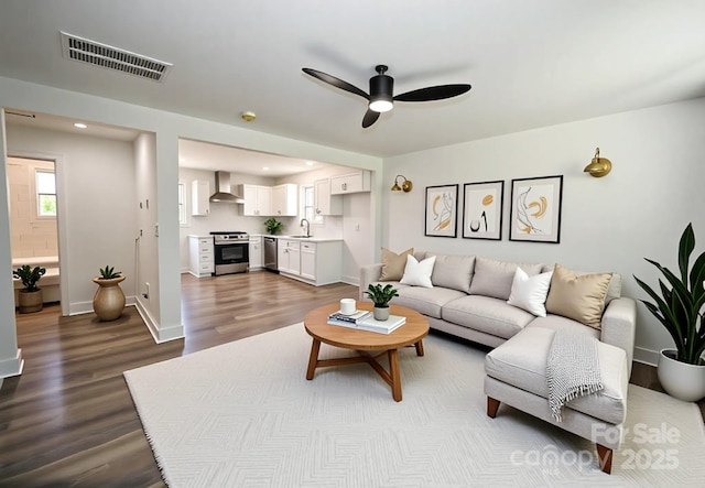 621 Cauthen St, Rock Hill, SC 29730 - living room featuring dark wood-type flooring, a ceiling fan, and baseboards