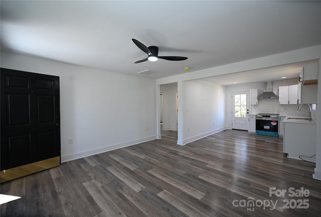 621 Cauthen St, Rock Hill, SC 29730 - unfurnished living room with a sink, dark wood-style floors, ceiling fan, and baseboards