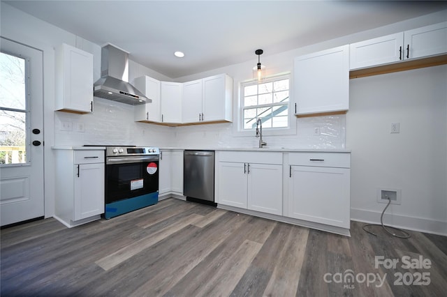 621 Cauthen St, Rock Hill, SC 29730 - kitchen featuring wall chimney range hood, appliances with stainless steel finishes, white cabinetry, dark wood-style floors, and recessed lighting