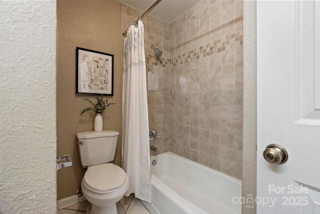 419 W 8th St, Charlotte, NC 28202 - bathroom featuring tile patterned floors, shower / bath combination with curtain, toilet, and a textured wall