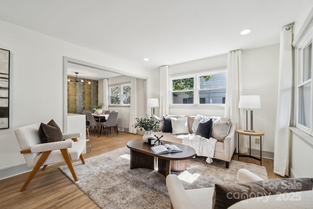 1749 Archdale Dr, Charlotte, NC 28210 - living area with wood finished floors, a chandelier, and recessed lighting