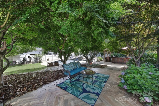 view of patio featuring fence