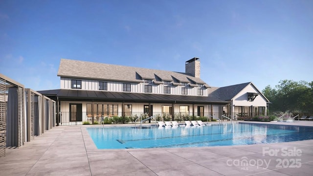 community pool featuring a patio area and fence