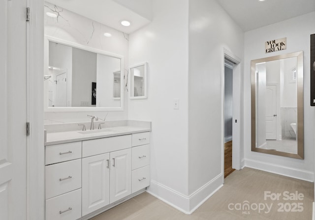 102 Stone Point Ct, Mooresville, NC 28117 - bathroom featuring vanity and baseboards