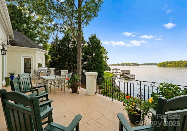 102 Stone Point Ct, Mooresville, NC 28117 - view of patio with area for grilling, outdoor dining space, and a water view