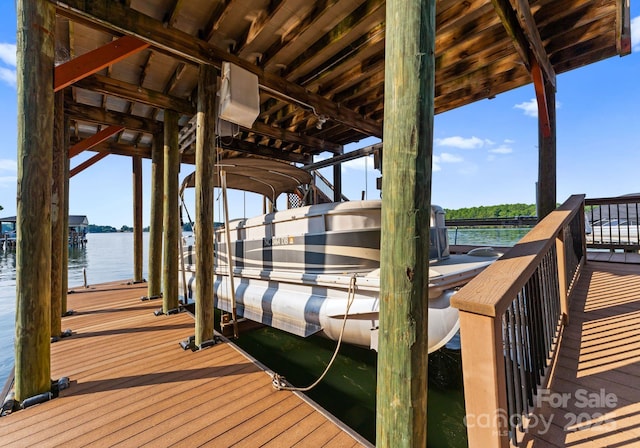 102 Stone Point Ct, Mooresville, NC 28117 - dock area featuring boat lift and a water view