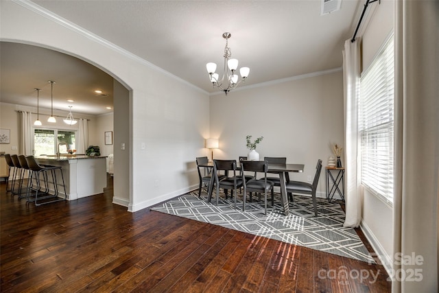 317 Praline Way, Fort Mill, SC 29715 - dining room featuring arched walkways, visible vents, baseboards, and dark wood-style floors
