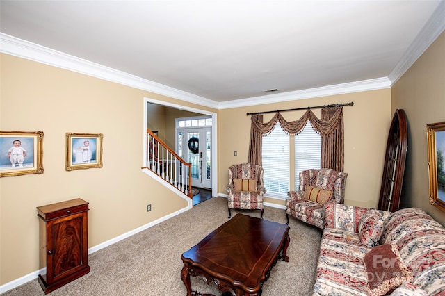 living area featuring visible vents, crown molding, baseboards, stairs, and carpet flooring