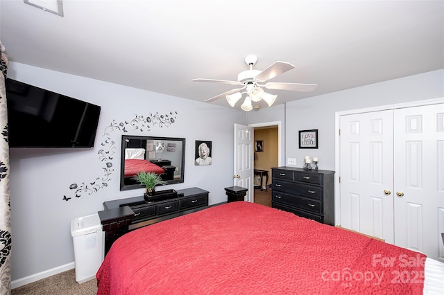 carpeted bedroom with baseboards, a closet, and ceiling fan