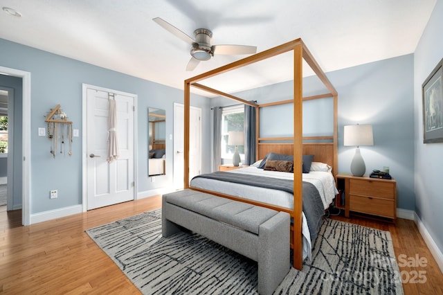 36 Brookcliff Dr, Asheville, NC 28804 - bedroom with baseboards, wood finished floors, and a ceiling fan